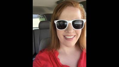 Redhead In Sunglasses