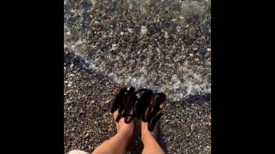 Wet Feet In Water At The Beach