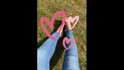 Bare Feet On Fresh Grass