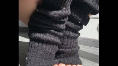 Black Polished Toe Nails And Leg Warmers