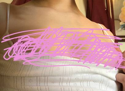 Hard Pink Nipples Peak Out Of Tiny Top