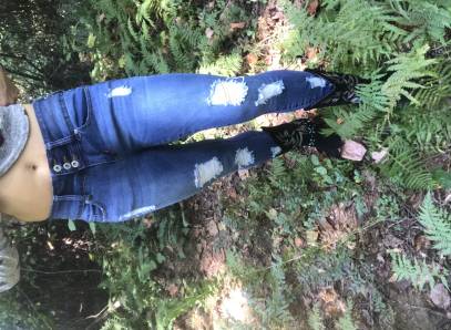 Topless Babe In Skinny Jeans And Cowgirl Boots In The Woods