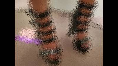 Pedicured Toes In Open Toed Heels