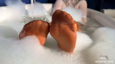 Scratching Mistress's Nylon Feet With A Scratcher In A Foam Bath