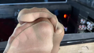 Beautiful Feet Of The Mistress In Flesh-Colored Tights Tease You On The Table Close-Up