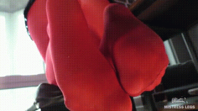 Mistress Legs In Red Pantyhose Toes And Soles Wiggling