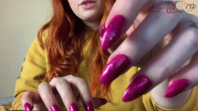 Pink Glittery Nails And Lotioned Hands