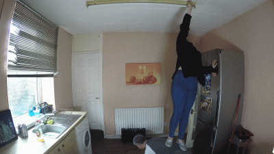 Our Girl Stands On Her Slaves Back To Fix The Light