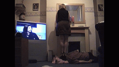 Lisa Doing Her Hair In The Mirror Whilst Stepping On Her Slave