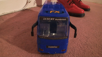 Big Blue Bus Stomped Under Sophie's Boots