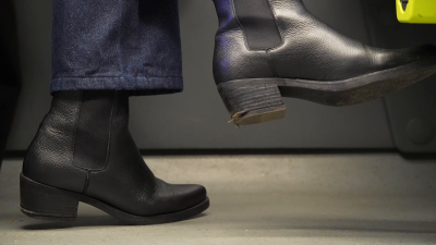 Candid Bratty Woman With Dirty Riding Boot Close-Up