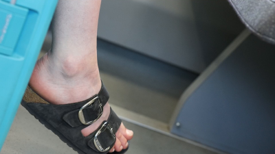 Candid Woman Feet With Birkentock Slippers