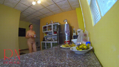 A Naked Housewife Is Preparing Dinner In The Kitchen. The Depraved Whimsical Housekeeper Works In The House Without Panties.2