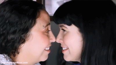 College Roommates Close Talking Nose To Nose