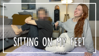Sitting On Women's Feet