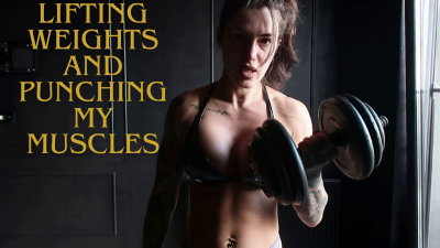 Lifting Weights And Punching My Muscles