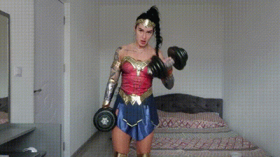 Gemmafitbunny Dressed Up As A Wonderwoman Doing A Workout And Flexing