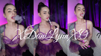 Smoking Wearing Purple Lace Bra And Tutu Skirt