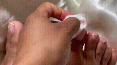 Removing Nail Polish On Right Foot