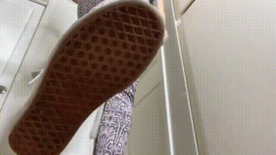 Shrunken Man Crammed In Sneakers