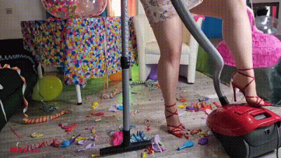 Mila Vacuuming After Pinata Smashing