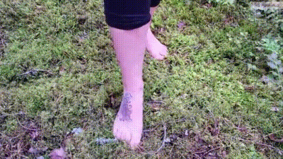 Beautiful Dirty Feet Trampling A Bed Of Moss