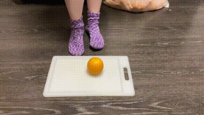 Crushing An Orange With My Feet
