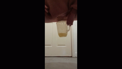 Pissing Into Big Measuring Jug. Yum Yum