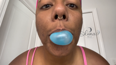 Bubblegum Babe With Pierced Nipples Blowing Bubbles
