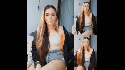 Smoking In Jean Shorts And A White Top. No Bra. Handsfree Drags, Powesmoking, Dangling