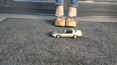 Abby Giantess Toy Car Crush 1980S Chevrolet Camaro In Chunky Denim Sandals Low Side View