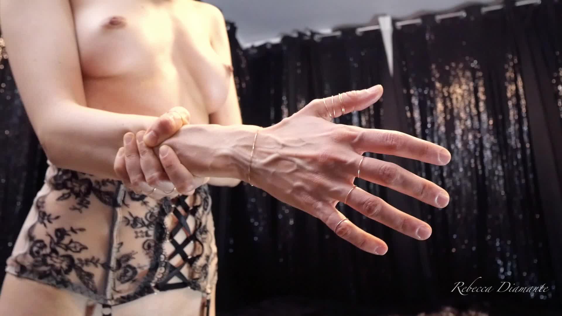 Rebecca Diamante Shows Her Hands' Veins In Topless