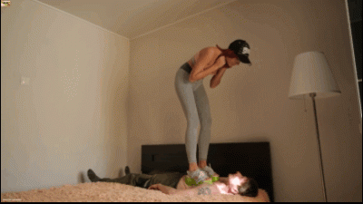 N102 Trampling Beautiful Joel. She Stomps The Body With Wide Shoes And Spits On The Face Of The Slave