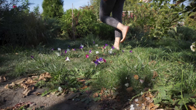 Crushing Flowers Barefoot In The Grass