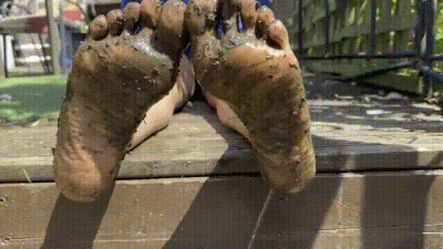 Muddy Soles Playing With Mud Between My Toes In My Back Garden