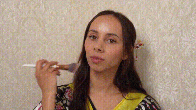Stroking My Face With A Brush In A Geisha Costume