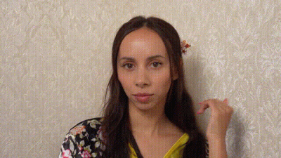 I'm Looking At The Camera In A Geisha Costume