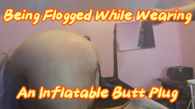 Inflatable Butt Plug While Getting Flogged