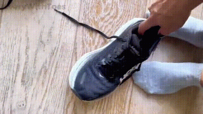 Shoe And Sock Removal After A Half-Marathon Sweaty Feet
