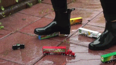 Destroy Some Toy Trucks In The Rain