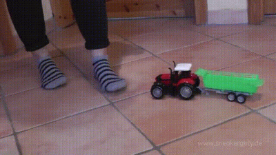 Toy Tractor Destruction With Socks