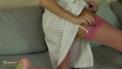 Slim Brunette Teases And Strips