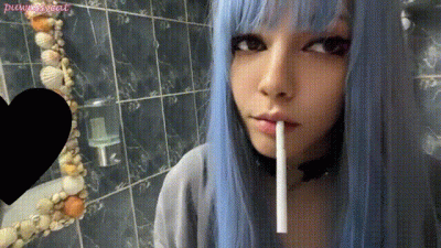 Blue Hair Goth Chick Smoking In Bathroom