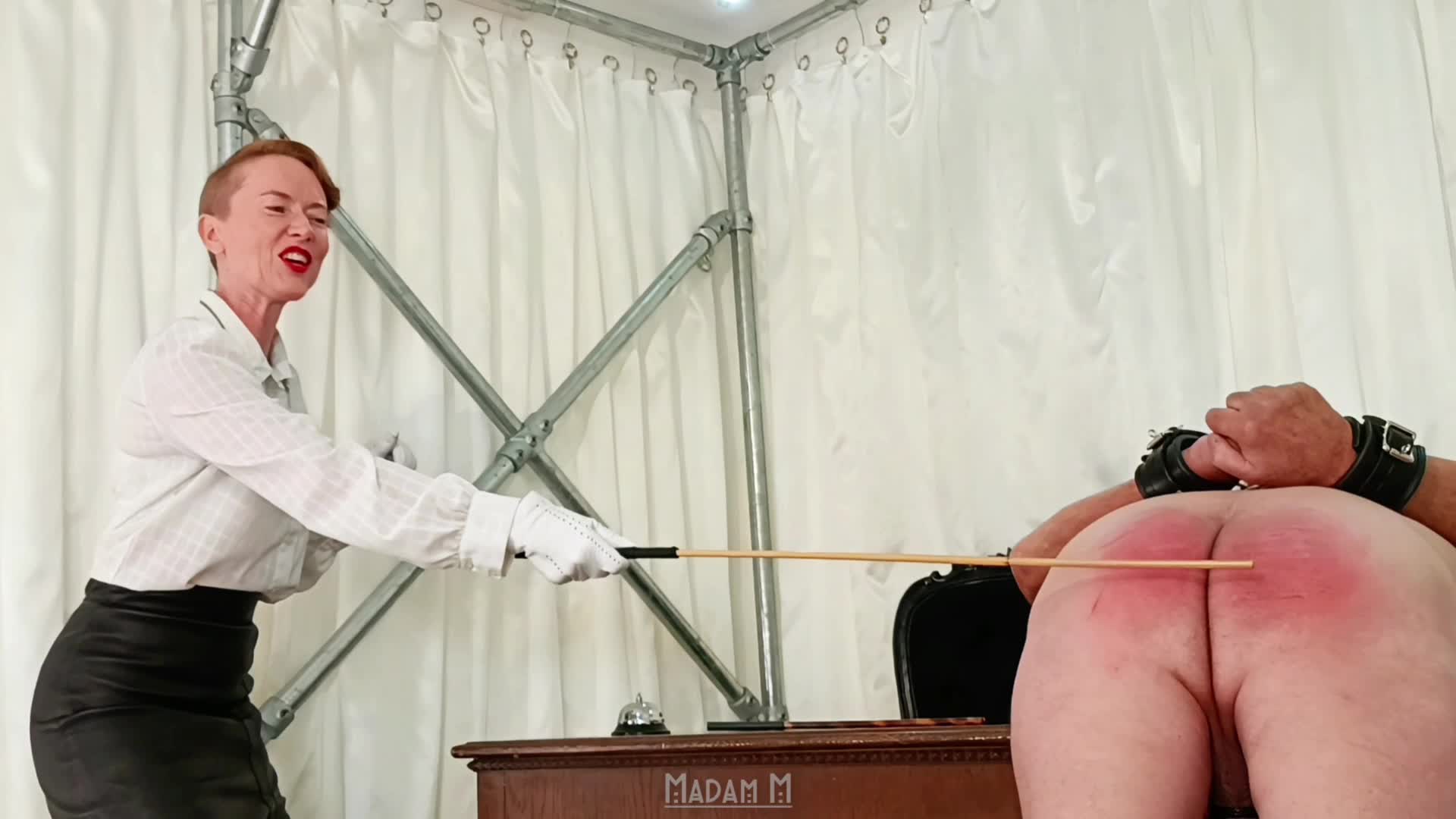 Indulging in a caning fantasy