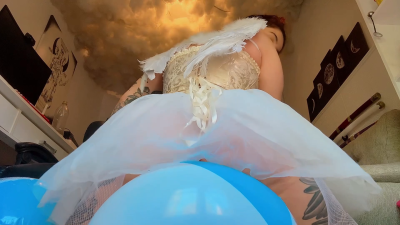 Angel Riding Beach Ball