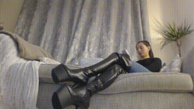Boots Worshipped By Human Footstool