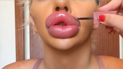 Vienna Xtreme Applying Lipgloss And Lipstick On Massive Fake Lips
