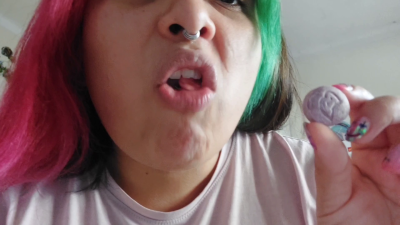 Playing With A Large Piece Of Chewing Gum