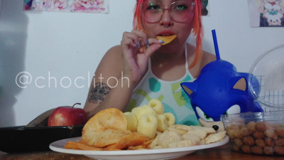 Chewing Junk Food And Fruits