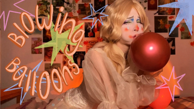 Clown Girl Blowing Balloons